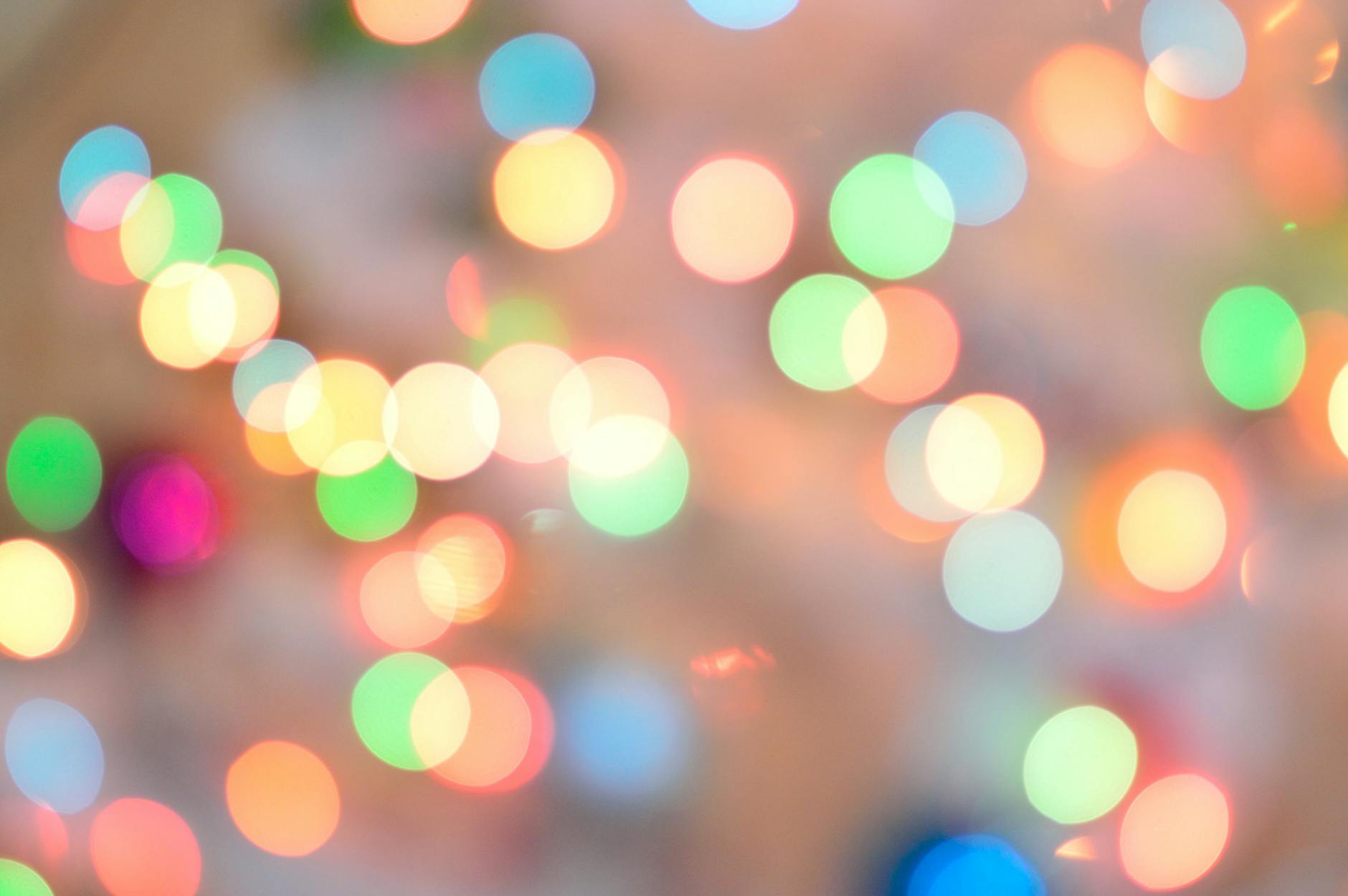 defocused image of illuminated christmas lights. georgefeola. georgefeola.io
