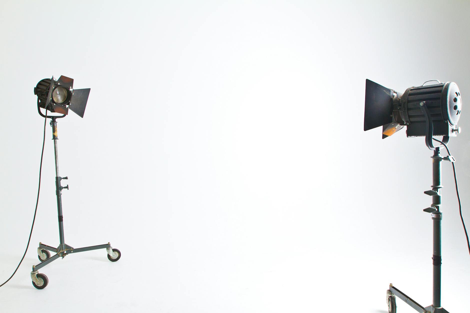 two studio lights on an empty studio