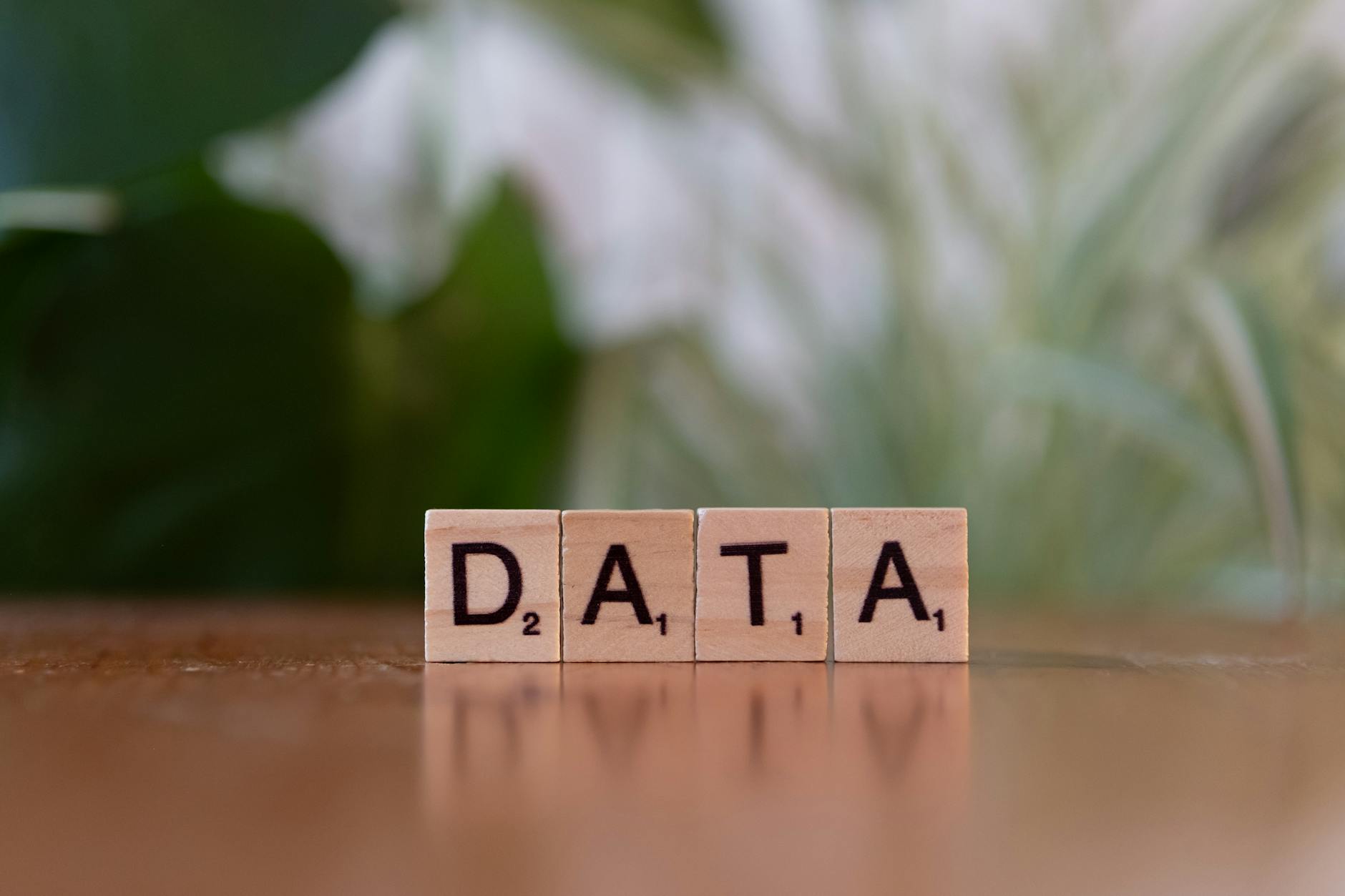 data scrabble tiles on wooden surface george feola georgefeola.io